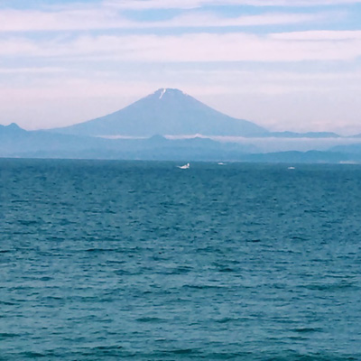 Mount Fuji seen from the coast of Hayama, Kanagawa prefecture on a rare sunny day during the rainy season